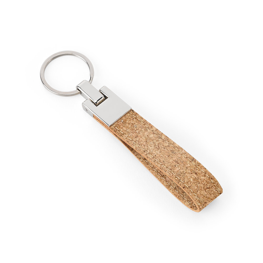 EVANS. Conjunto composto por uma caneta esferográfica e chaveiro, ambos em metal e cortiça